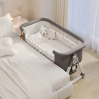 Berceau pour nourrisson. Utilisable comme lit de voyage, berceau fixe, lit à bascule, lit avec moustiquaire ou lit d’appoint.

